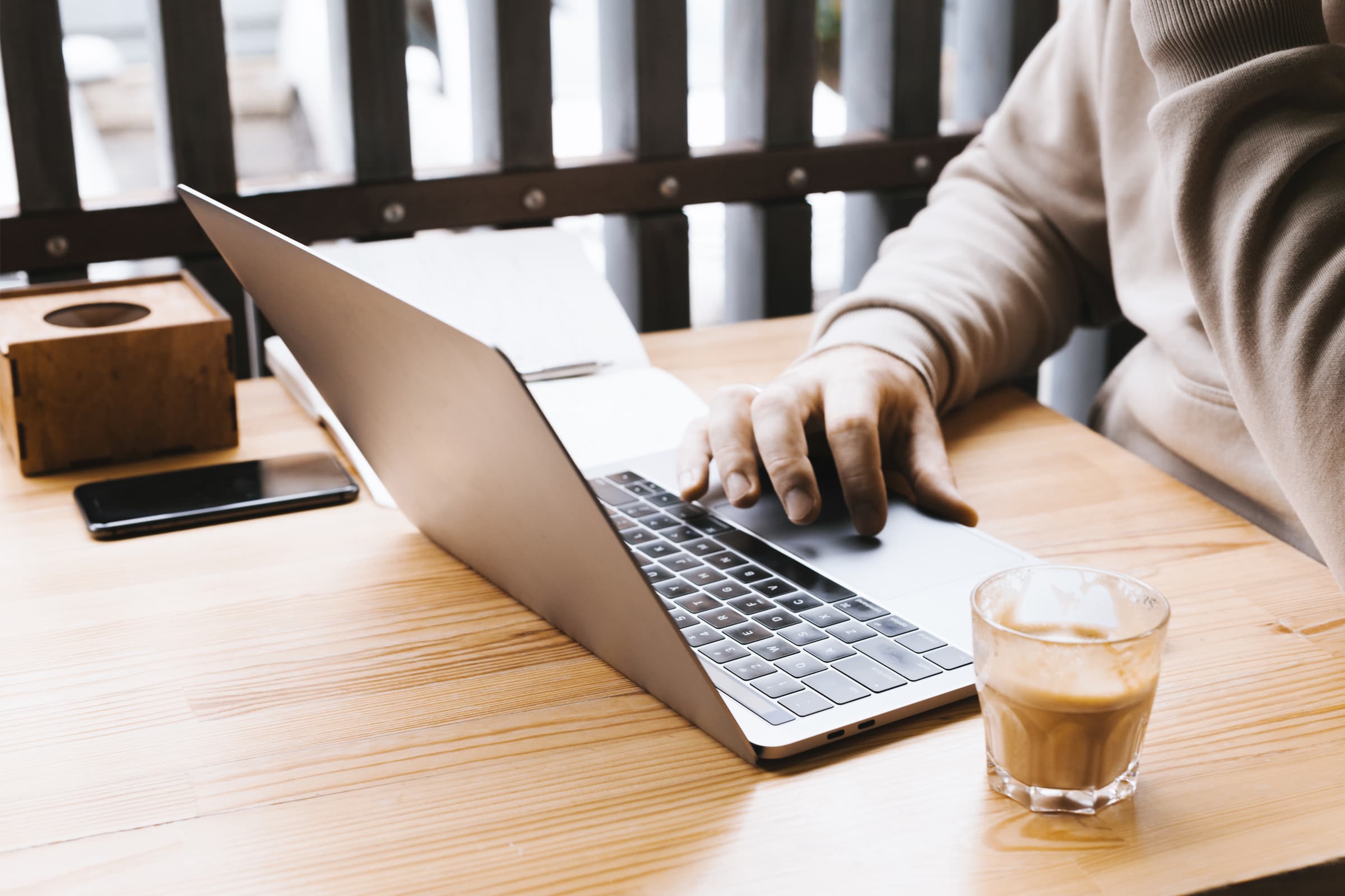 Business owner reviewing customer feedback on laptop